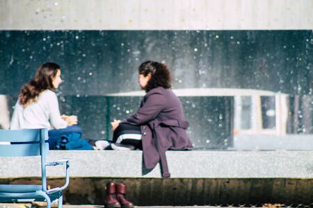 Tel Aviv Israel February 02, 2020 View of unidentified Israeli people sitting in the streets of Tel Aviv in winterの写真素材