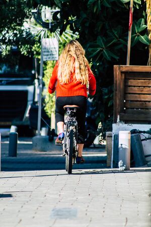 Tel Aviv Israel February 04, 2020 View of unidentified people rolling with a bicycle in the streets...