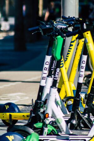 Tel Aviv Israel February 13, 2020 View of an electric scooter parked in the streets of Tel Aviv in the afternoonの写真素材