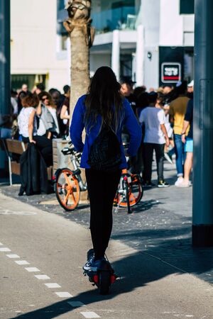 Tel Aviv Israel February 15, 2020 View of unidentified people rolling with an electric scooter in...