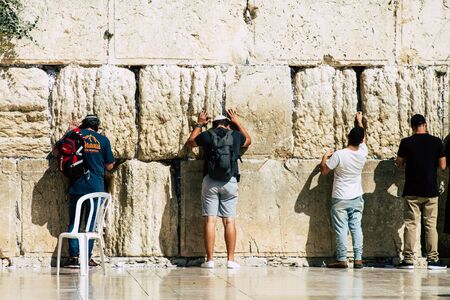 Jerusalem Israel October 06, 2019 View of unknowns Israeli people praying front the Western wall in the Old city of Jerusalem in the afternoonのeditorial素材