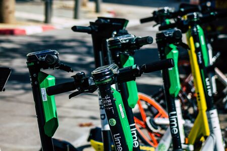 Tel Aviv Israel February 20, 2020 View of an electric scooter parked in the streets of Tel Aviv in the afternoonの写真素材