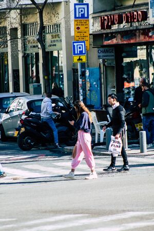 Tel Aviv Israel February 20, 2020 View of unidentified people walking in the streets of Tel Aviv during a sunny day in winterのeditorial素材