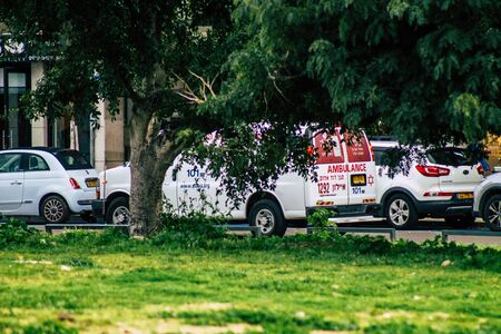 Tel Aviv Israel February 25, 2020 View of a Israeli ambulance rolling in the streets of Tel Aviv in the eveningの写真素材