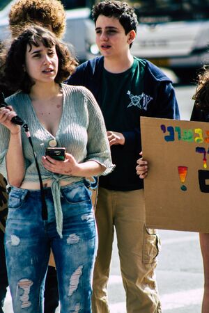 Tel Aviv Israel February 21, 2020 View of unidentified Israeli teenagers demonstrating in front of the Tel Aviv town hall against global warming and supporting Greta Thunbergのeditorial素材