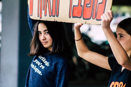 Tel Aviv Israel February 21, 2020 View of unidentified Israeli teenagers demonstrating in front of the Tel Aviv town hall against global warming and supporting Greta Thunbergのeditorial素材