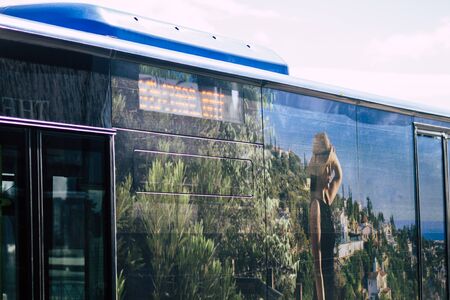 Paphos Cyprus February 29, 2020 View of a traditional public bus rolling in the streets of Paphos in the afternoonの写真素材