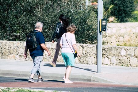 Paphos Cyprus February 29, 2020 View of unidentified people walking in the streets of Paphos in the afternoonの写真素材