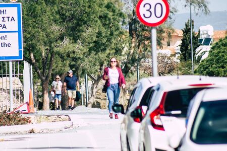 Paphos Cyprus February 29, 2020 View of unidentified people walking in the streets of Paphos in the afternoonの写真素材