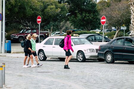 Paphos Cyprus February 29, 2020 View of unidentified people walking in the streets of Paphos in the afternoonの写真素材