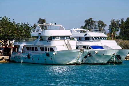 Paphos Cyprus March 01, 2020 View of boats moored in the harbour of Paphos in the afternoonの写真素材
