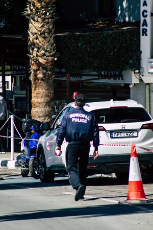 Paphos Cyprus March 01, 2020 View of a police officer in the streets of Paphos in the afternoon