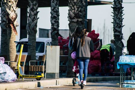 Tel Aviv Israel February 28, 2020 View of unidentified people rolling with an electric scooter in...