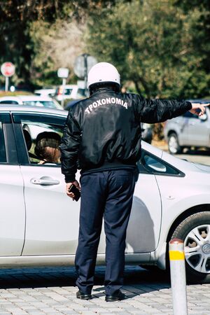 Paphos Cyprus March 01, 2020 View of a police officer in the streets of Paphos in the afternoon