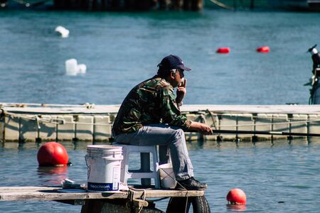 Paphos Cyprus March 01, 2020 View of unidentified people having fun on the beach of Paphos in the afternoonの写真素材