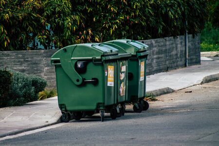 Paphos Cyprus March 06, 2020 Closeup of a garbage container in the streets of Paphos in the afternoonの写真素材