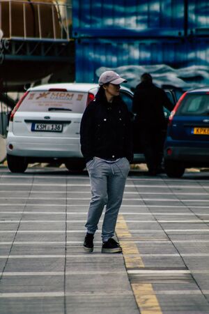 Limassol Cyprus March 13, 2020 View of unidentified tourist walking in the streets of Limassol in the afternoonの写真素材