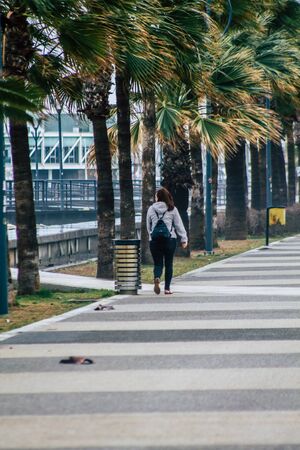 Limassol Cyprus March 13, 2020 View of unidentified tourist walking in the streets of Limassol in...