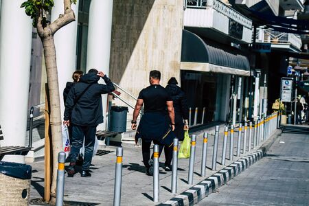 Limassol Cyprus March 13, 2020 View of unidentified tourist walking in the streets of Limassol in the afternoonの写真素材