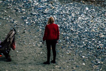 Limassol Cyprus March 20, 2020 View of unidentified people having fun on the beach of Limassol in...