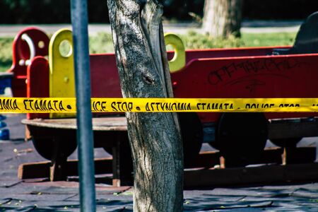 Limassol Cyprus March 24, 2020 View of police sign in a public garden due to the epidemic of Coronavirus in the city of Limassol in Cyprus islandの写真素材