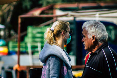 Limassol Cyprus March 14, 2020 View of an unidentified people with a face mask to protect themselves...