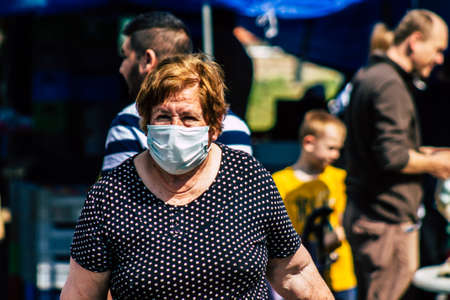 Limassol Cyprus March 14, 2020 View of an unidentified people with a face mask to protect themselves...