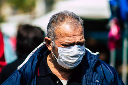 Limassol Cyprus March 14, 2020 View of an unidentified people with a face mask to protect themselves...