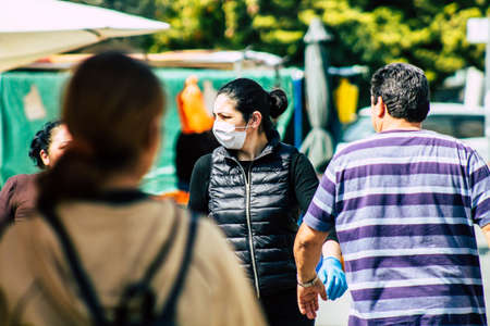 Limassol Cyprus March 14, 2020 View of an unidentified people with a face mask to protect themselves...