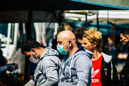 Limassol Cyprus March 14, 2020 View of an unidentified people with a face mask to protect themselves...