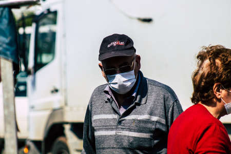 Limassol Cyprus March 14, 2020 View of an unidentified people with a face mask to protect themselves...