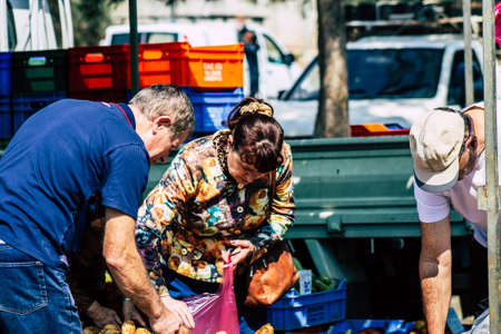 Limassol Cyprus March 14, 2020 View of an unidentified people shopping at the market of Limassol in the morningのeditorial素材