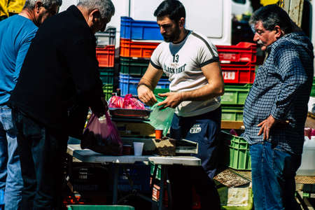 Limassol Cyprus March 14, 2020 View of an unidentified people shopping at the market of Limassol in the morningのeditorial素材