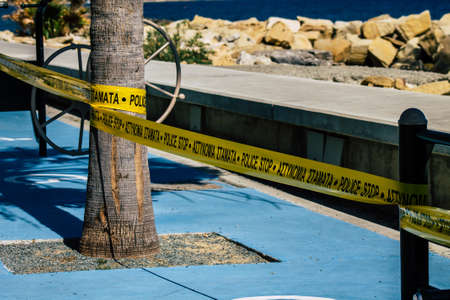 Limassol Cyprus March 24, 2020 View of police sign in a public garden due to the epidemic of...
