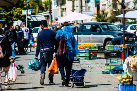 Limassol Cyprus March 14, 2020 View of an unidentified people shopping at the market of Limassol in the morningのeditorial素材