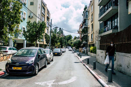 Tel Aviv Israel March 31, 2020 View of unidentified people walking in the empty streets of Tel Aviv during the quarantine of the population to prevent the spread of coronavirusのeditorial素材