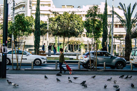 Tel Aviv Israel March 31, 2020 View of unidentified people walking in the empty streets of Tel Aviv during the quarantine of the population to prevent the spread of coronavirusのeditorial素材