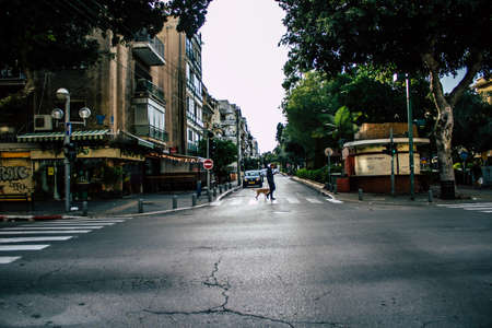 Tel Aviv Israel March 31, 2020 View of unidentified people walking in the empty streets of Tel Aviv...