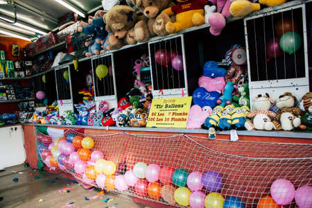 Reims France April 21, 2019 View of fun fair with its colorful stands located in the center of the city of Reims in the afternoonのeditorial素材