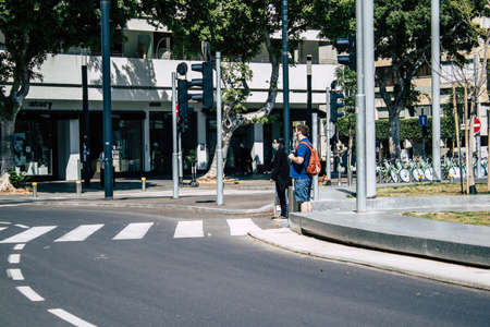 Tel Aviv Israel April 12, 2020 View of unidentified people walking in the empty streets of Tel Aviv...
