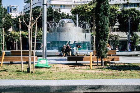 Tel Aviv Israel April 12, 2020 View of unidentified people sitting in the empty streets of Tel Aviv during the quarantine of the population to prevent the spread of the coronavirusのeditorial素材