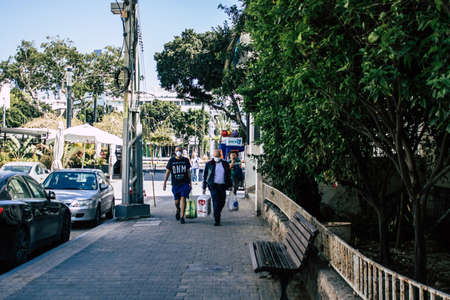Tel Aviv Israel April 12, 2020 View of unidentified people walking in the empty streets of Tel Aviv...