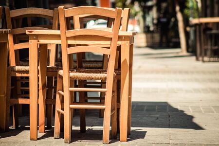 Limassol Cyprus  View of various chairs and tables from restaurants closed to the public by the government during the quarantine of the population to prevent the spread of coronavirusの写真素材