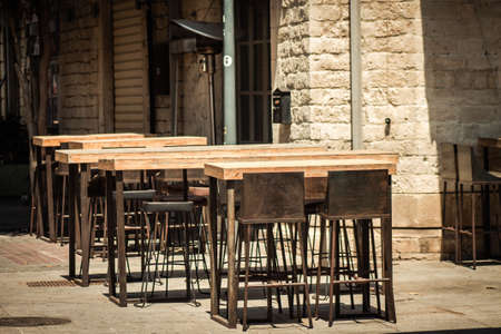 Limassol Cyprus April 16, 2020 View of various chairs and tables from restaurants closed to the public by the government during the quarantine of the population to prevent the spread of coronavirusのeditorial素材