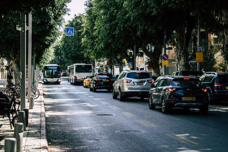 Tel Aviv Israel May 03, 2020 View of a Israeli public city bus rolling in Dizengoff street in Tel Aviv in the afternoon during the coronavirus outbreakのeditorial素材