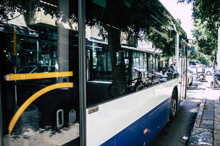 Tel Aviv Israel May 03, 2020 View of a Israeli public city bus rolling in Dizengoff street in Tel Aviv in the afternoon during the coronavirus outbreakのeditorial素材