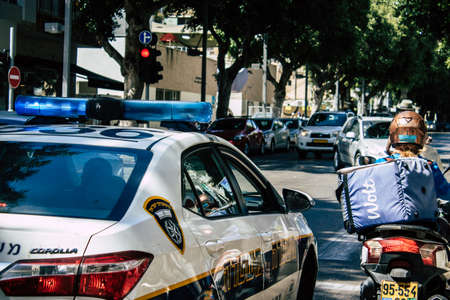Tel Aviv Israel May 03, 2020 View of a Israeli police car rolling in Dizengoff street in Tel Aviv in the afternoon during the coronavirus outbreakのeditorial素材