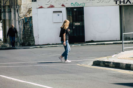 Limassol Cyprus May 05, 2020 View of unidentified people walking in the streets of Limassol in the afternoon during the coronavirus outbreakのeditorial素材