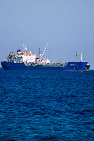 Limassol Cyprus May 05, 2020 View of a ship off the Cypriot coast facing the city of Limassol in the afternoon during the coronavirus outbreakのeditorial素材