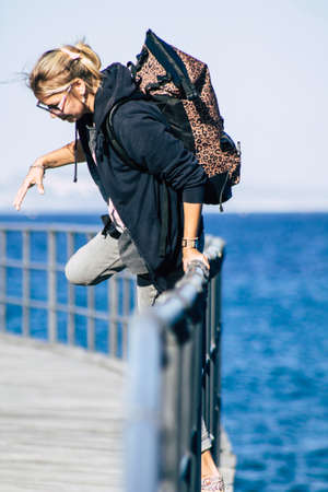 Limassol Cyprus May 05, 2020 View of unidentified young woman having fun on the beach of Limassol in...